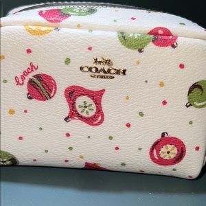 Coach exclusive mini pouch Christmas themed